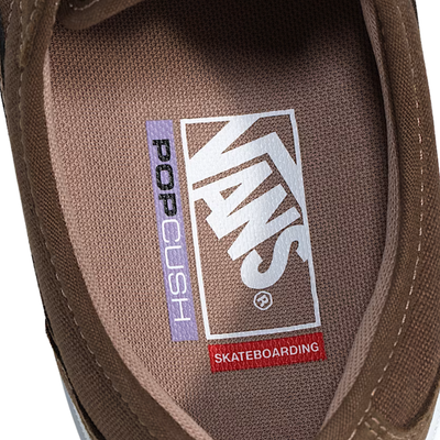 Brown curren caples vans skateboard sneaker with white sole on a white background