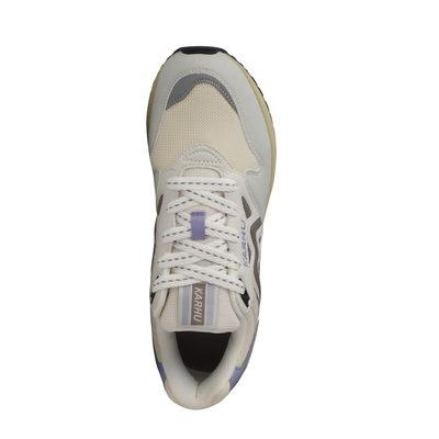 A low-top Legacy 96 sneaker by KARHU in light gray and off-white, featuring a lavender purple heel accent, dark gray side stripes, and a beige midsole.