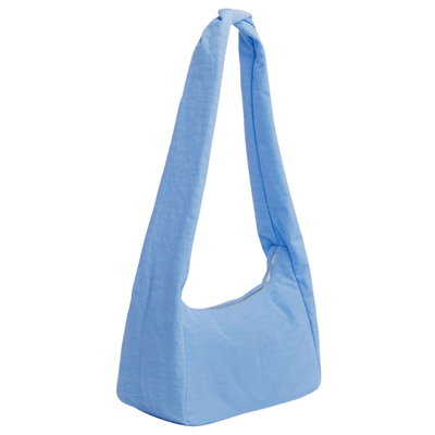 Light blue baggu nylon meringue shoulder bag on a white background