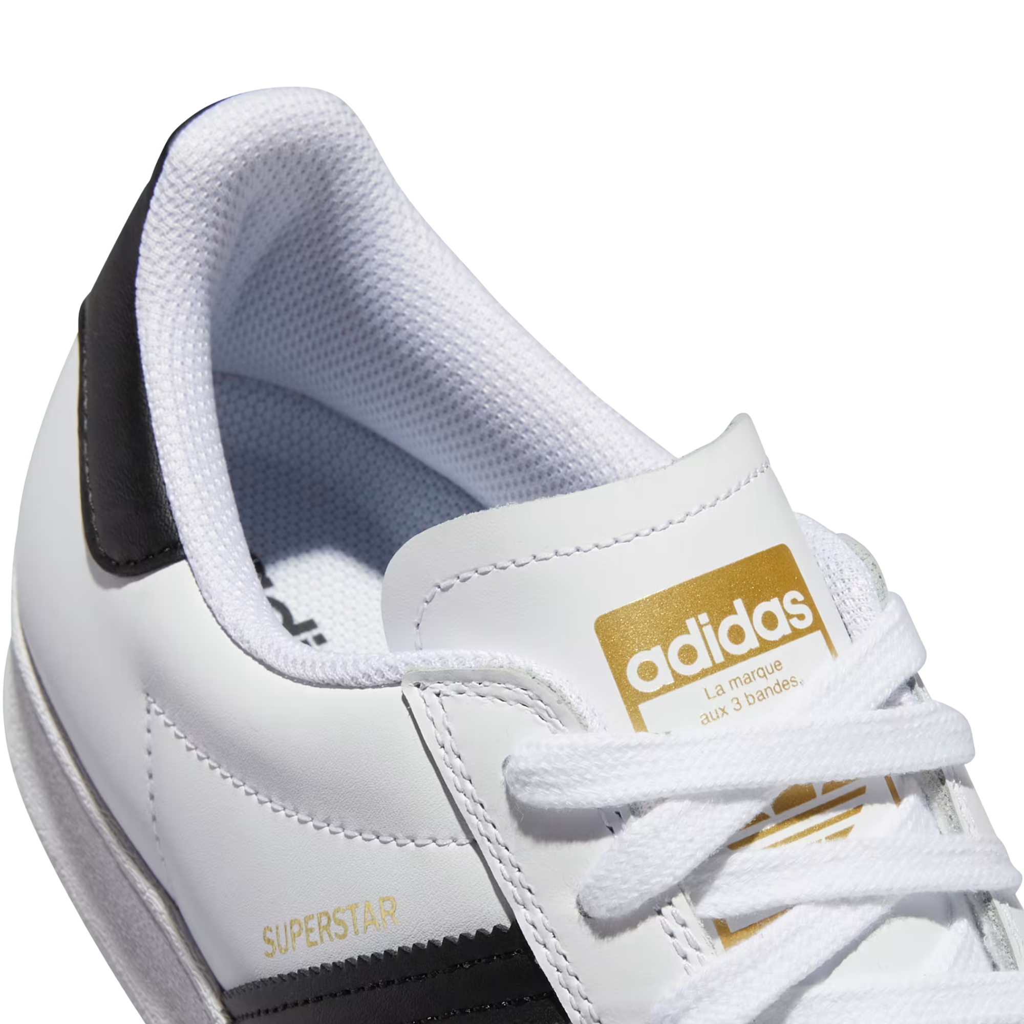 White Adidas Superstar sneaker with black stripes on a white background