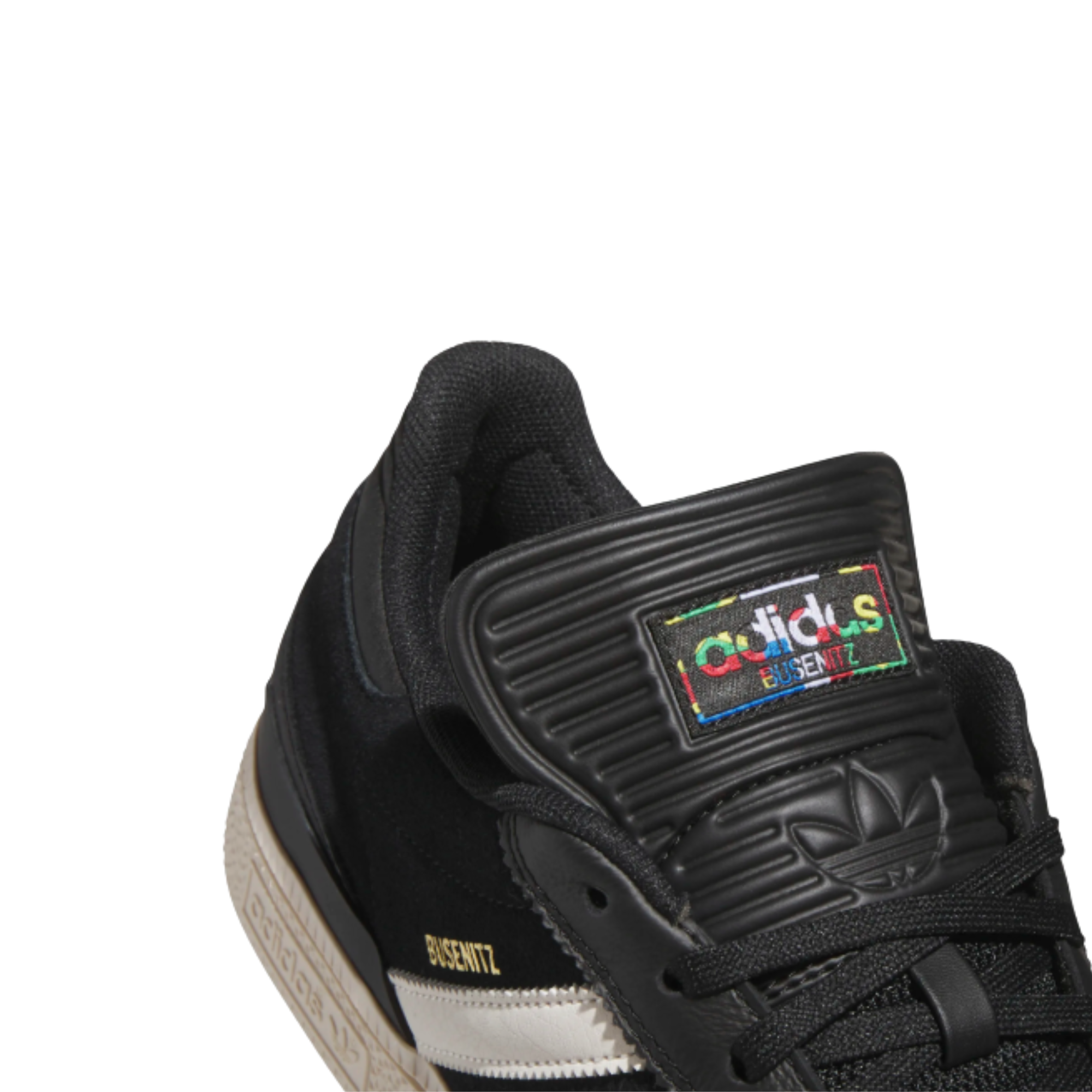 black leather adidas busenitz skateboard sneaker with an off white sole on a white background