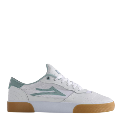 White lakai cambridge elite sneaker with light blue accents and brown sole on a white background
