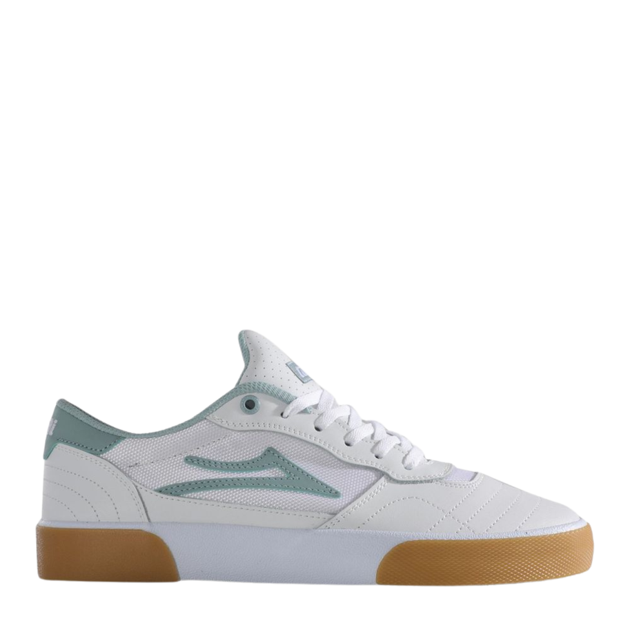White lakai cambridge elite sneaker with light blue accents and brown sole on a white background