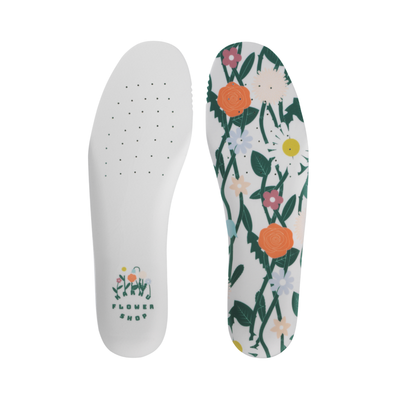 Floral-patterned insole with 'Karhu Flower Shop' branding on a white background
