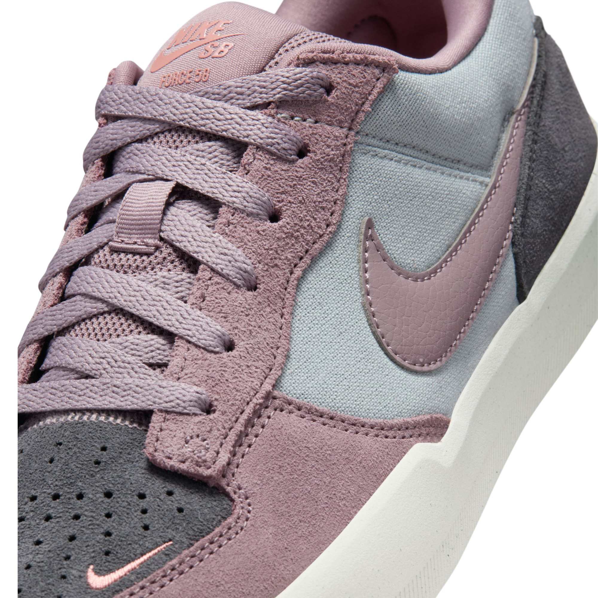 Multicolor NIKE SB women's force 58 sneaker with a pink swoosh on a white background