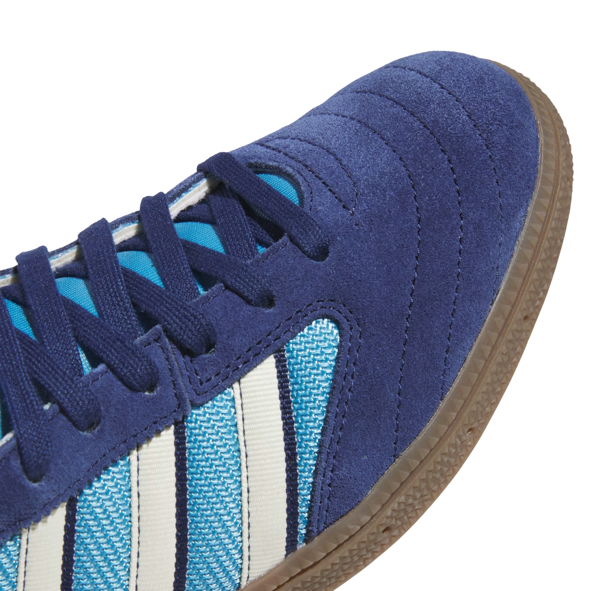 navy and bright blue adidas men's busenitz vintage skateboard shoes with white stripes and a gum sole on a white background