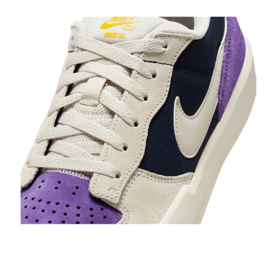nike sb women's force 58 Sneaker with purple and navy accents on a white background