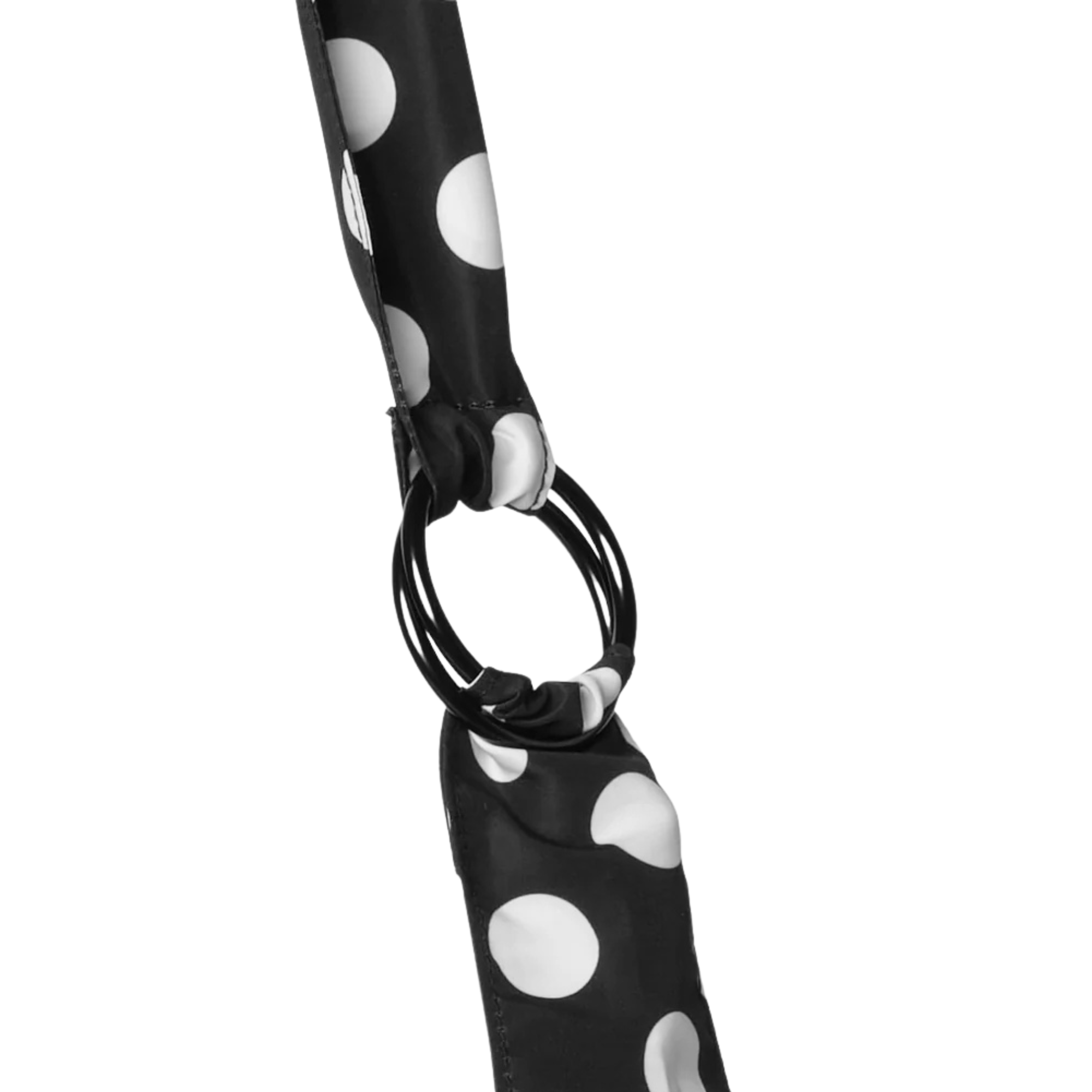 strap of a black thread slouchy shoulder bag with white polka dots on a white background