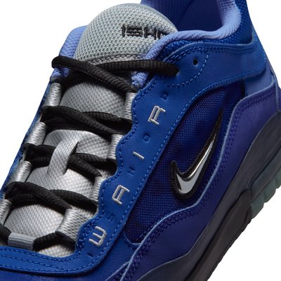 A Nike sb ishod wair Air Max sneaker in a vibrant royal blue colorway, featuring a black Swoosh logo, black laces, and a black midsole, shown from a side profile on a white background.