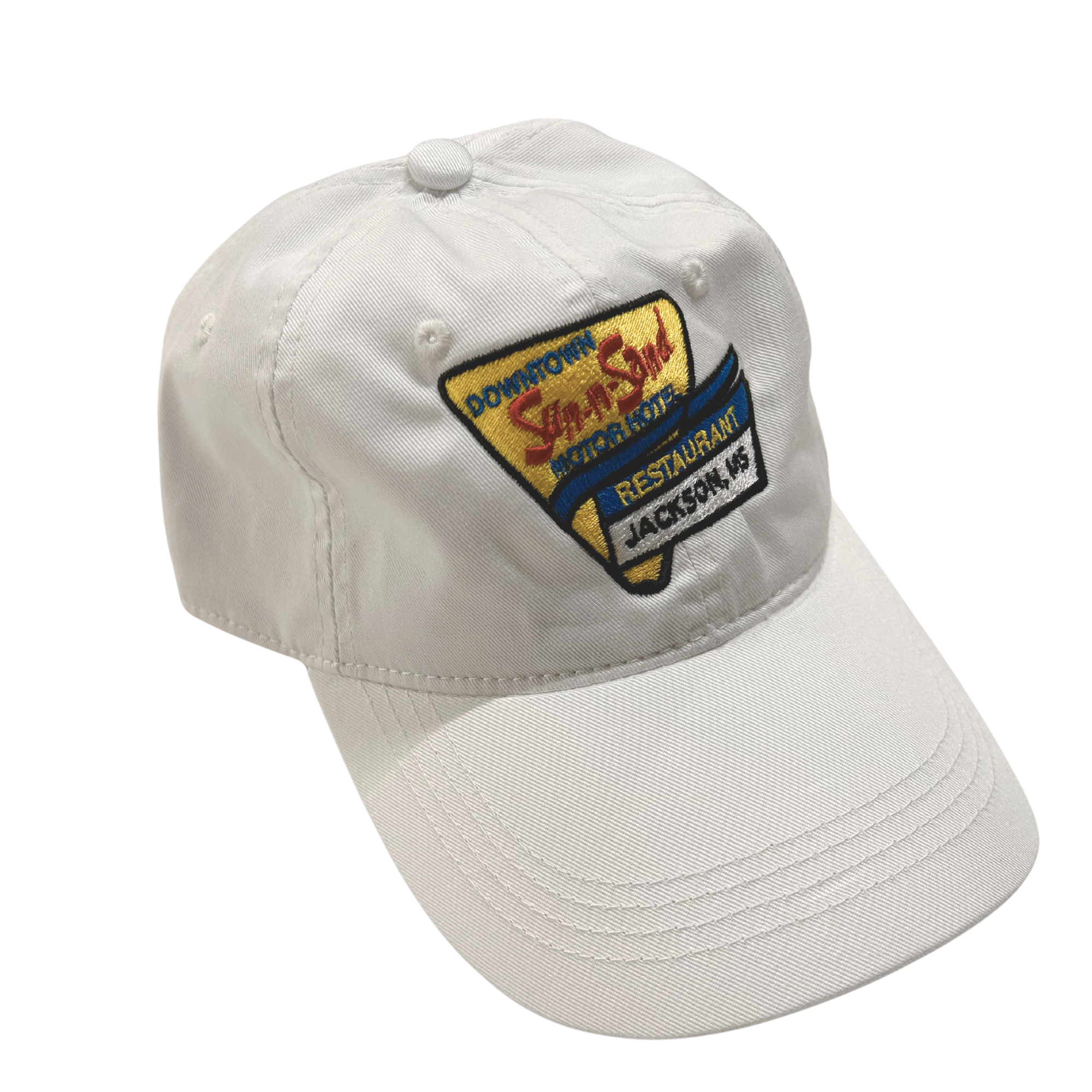 White cap with a downtown jackson sun-n-sand logo on a white background