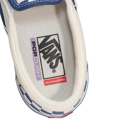 Close-up of a Vans Checkered skate slip-on shoe with blue and white pattern on a white background