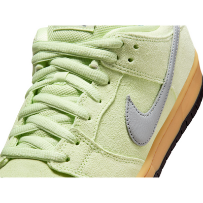 Light green nike sb verdugo mountains nike sb dunk low sneaker with a gray swoosh logo on a white background