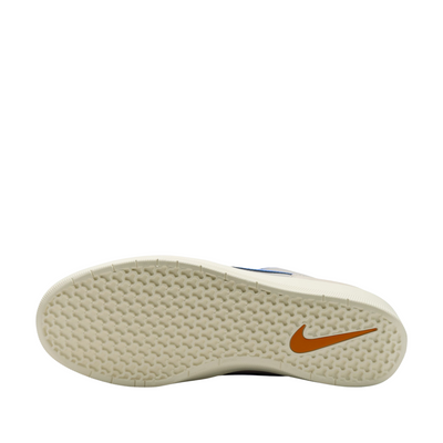 Sole of a shoe with a Nike logo on a white background