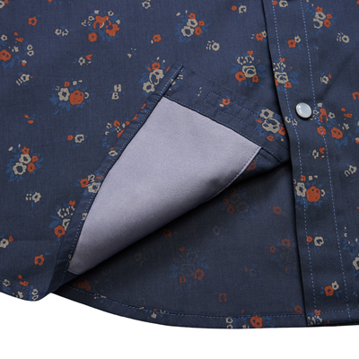 close up of a Holwer Brothers H Bar B Snapshirt Bouquets in a midnight blue wiht small all-over floral print on a white background