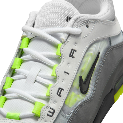 Gray and black nike sb air max ishod wair sneaker with neon green accents on a white background