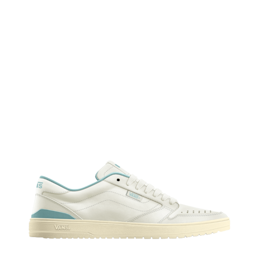 white vans low court shoe with blue green details on a white background