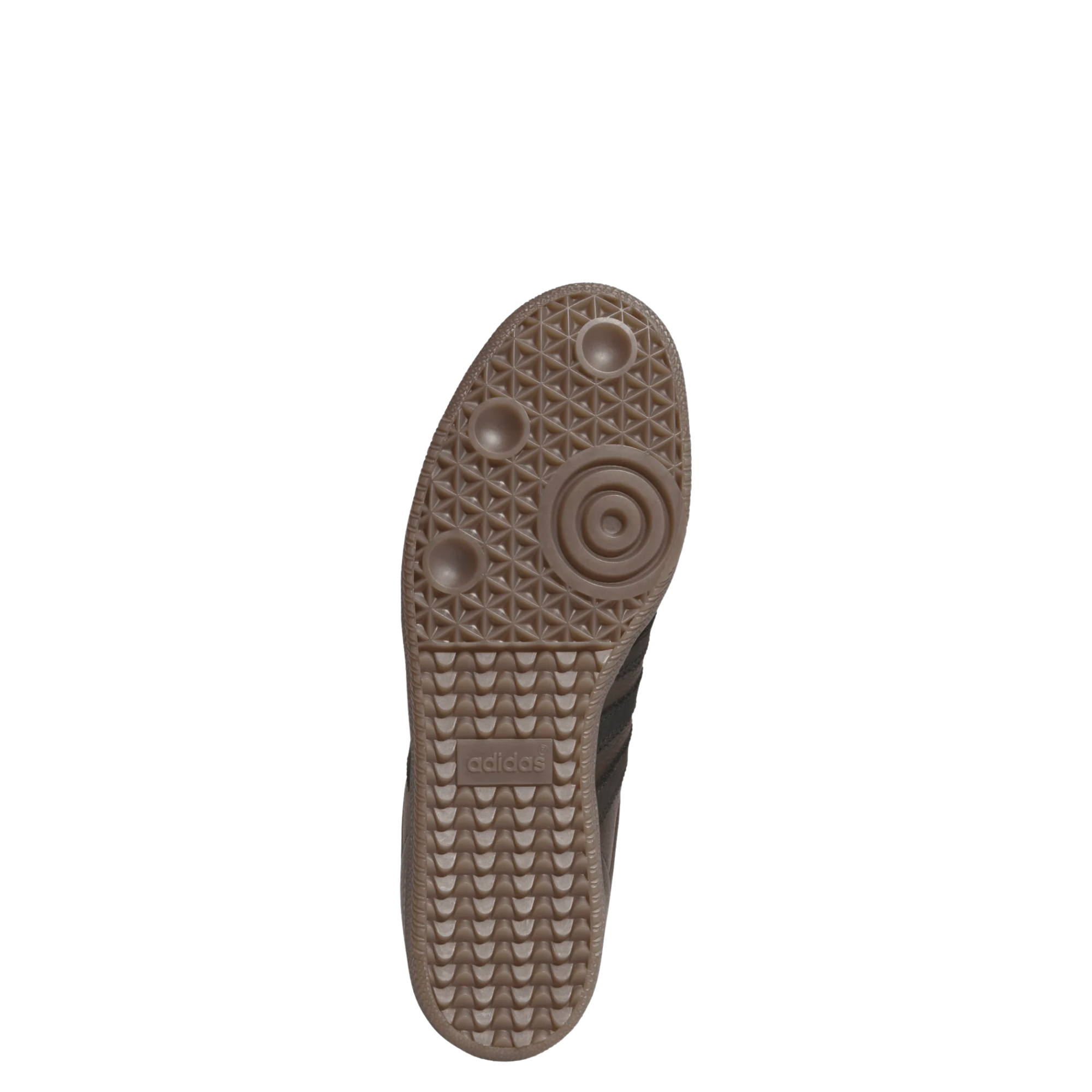 bottom of a brown leather and suede men's adidas skateboarding adv sneaker with gum sole on a white background