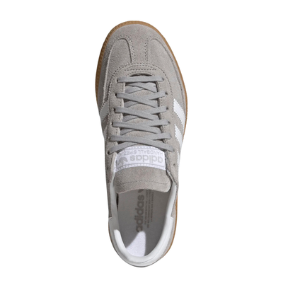 grey adidas handball spezial juniors sneakers with white stripes and gum sole on a white background