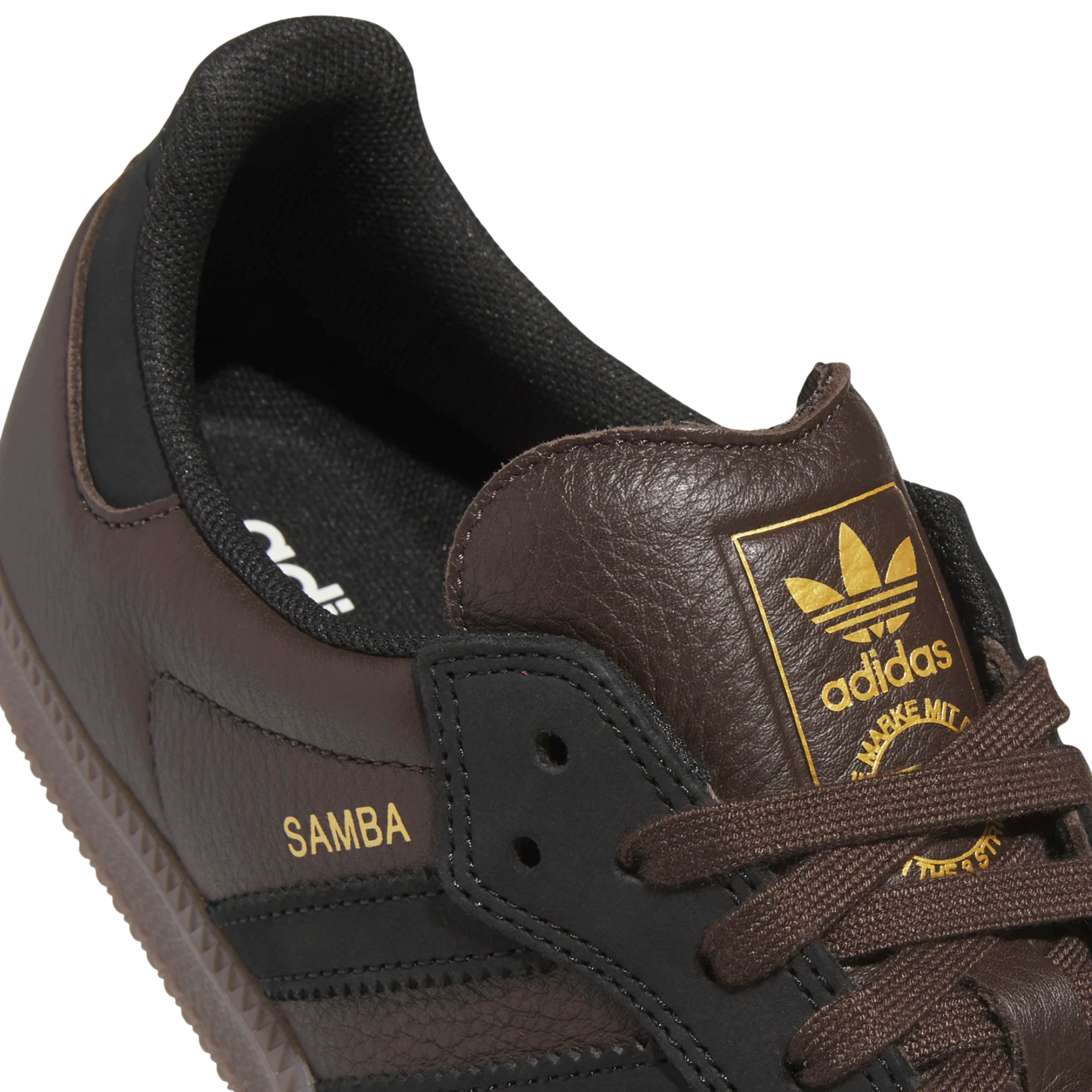 brown leather and suede men's adidas skateboarding adv sneaker with gum sole on a white background