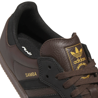brown leather and suede men's adidas skateboarding adv sneaker with gum sole on a white background