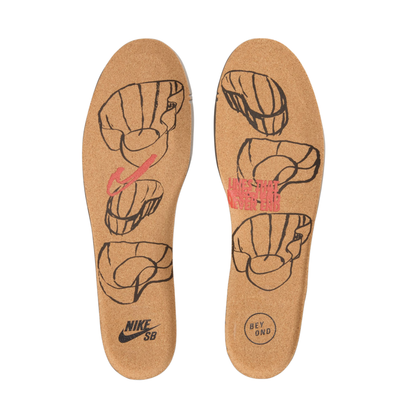 A pair of Nike SB custom-fit cork insoles, shown from the top on a white background. The tan cork insoles feature black line-art sketches of sneakers, a red scribble graphic, the black Nike SB logo, and a circular 'BEYOND' stamp.