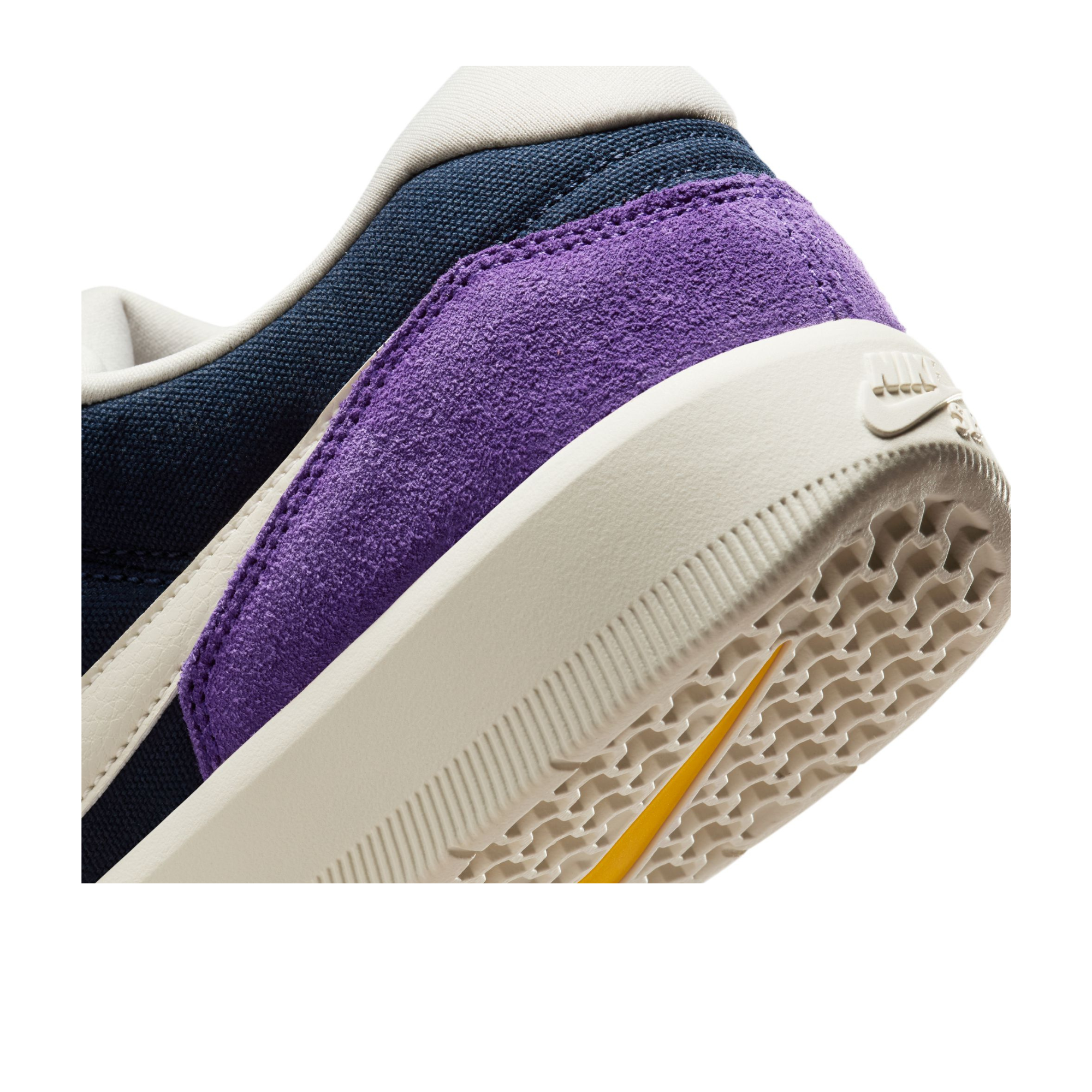 nike sb women's force 58 Sneaker with purple and navy accents on a white background