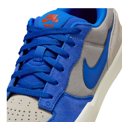 Blue and gray nike sb force 58 sneaker on a white background