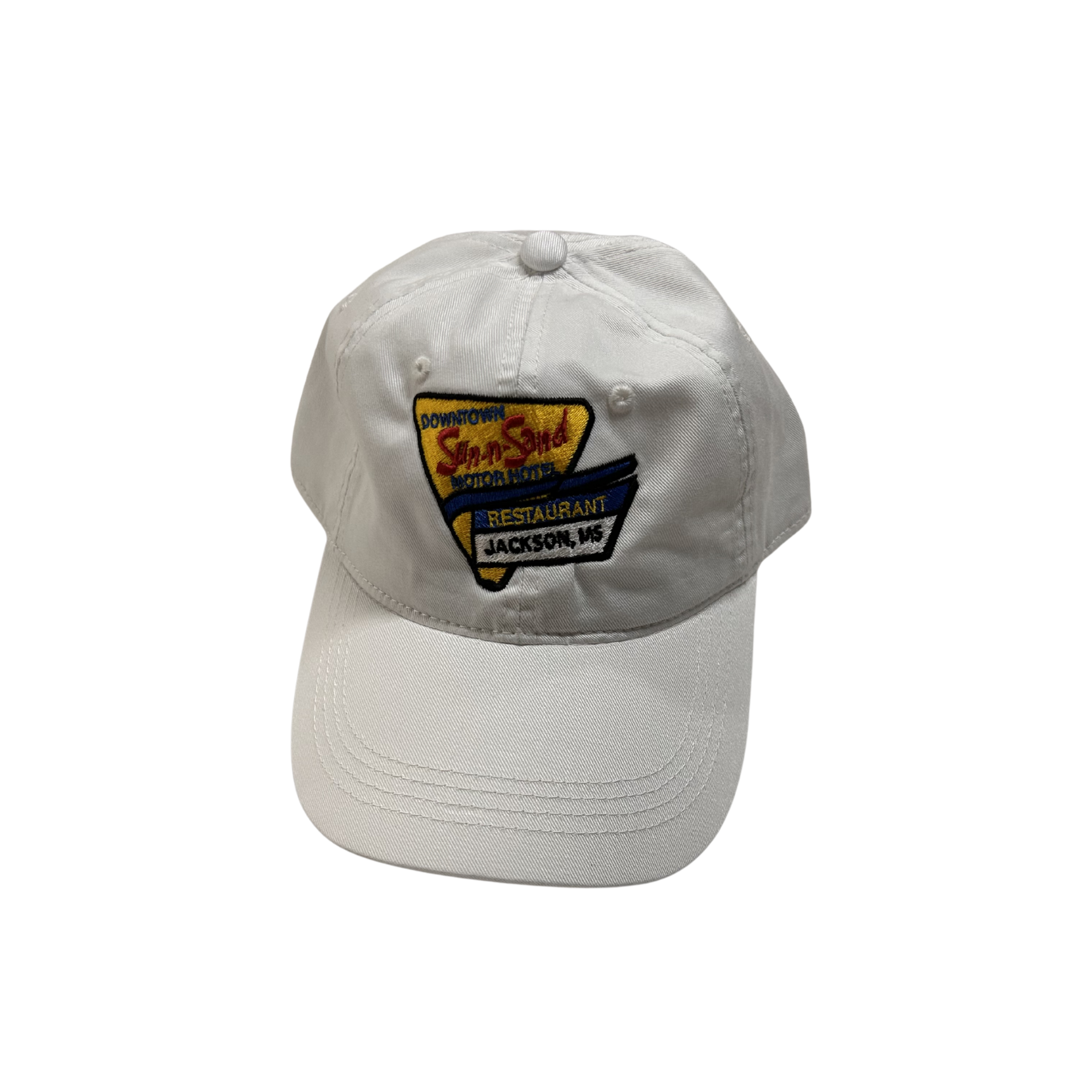 White cap with a downtown jackson sun-n-sand logo on a white background