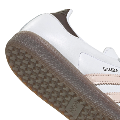 white adidas women's samba og with pale pink stripes and gum sole on a white background