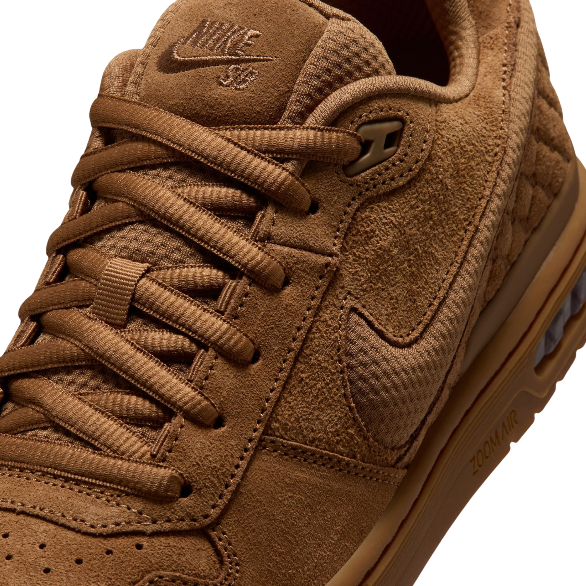 all tan nike sb paul rodriguez skateboard shoe on a white background