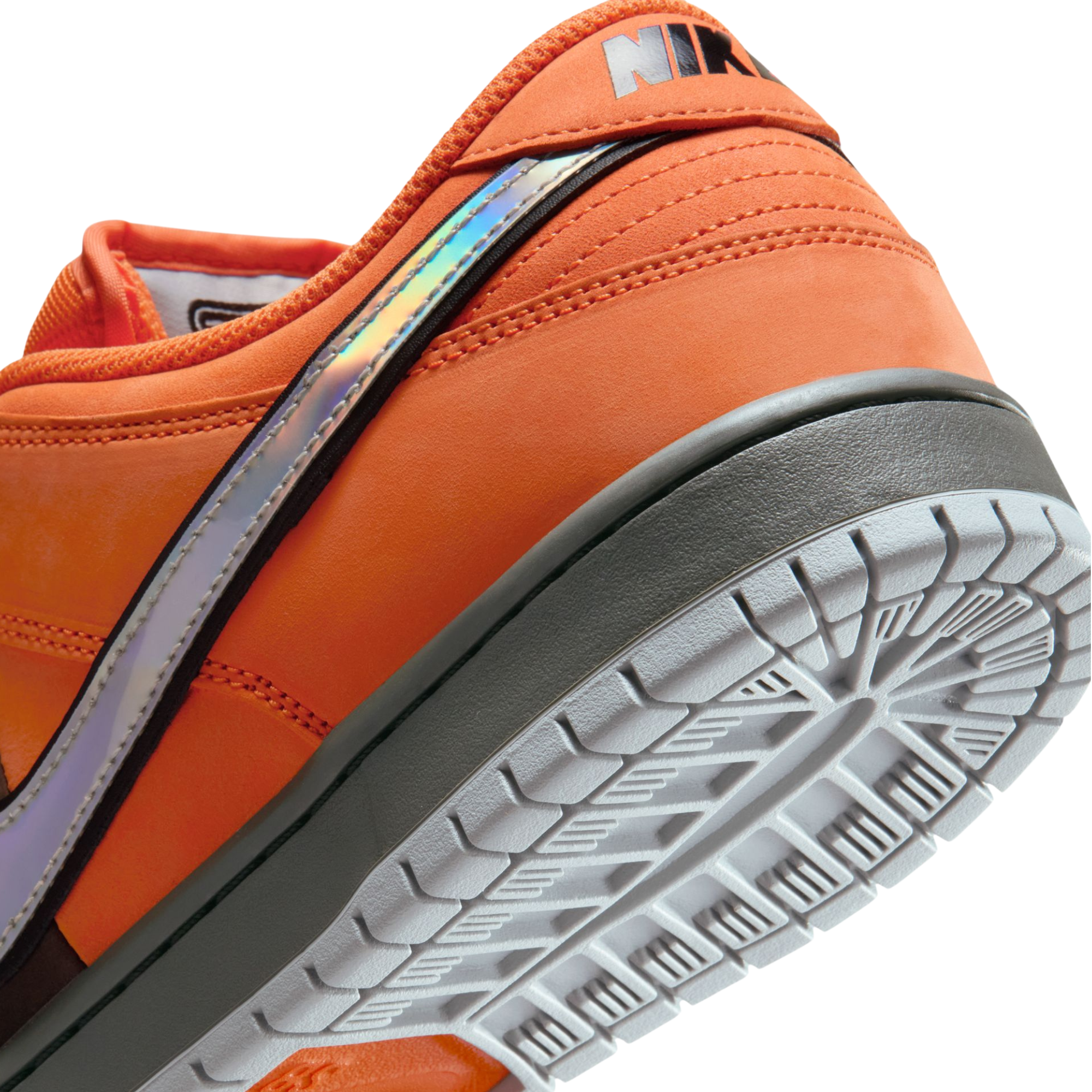 Orange and brown nike sb dunk low pro muni fast pass sneaker with a colorful swoosh logo on a white background