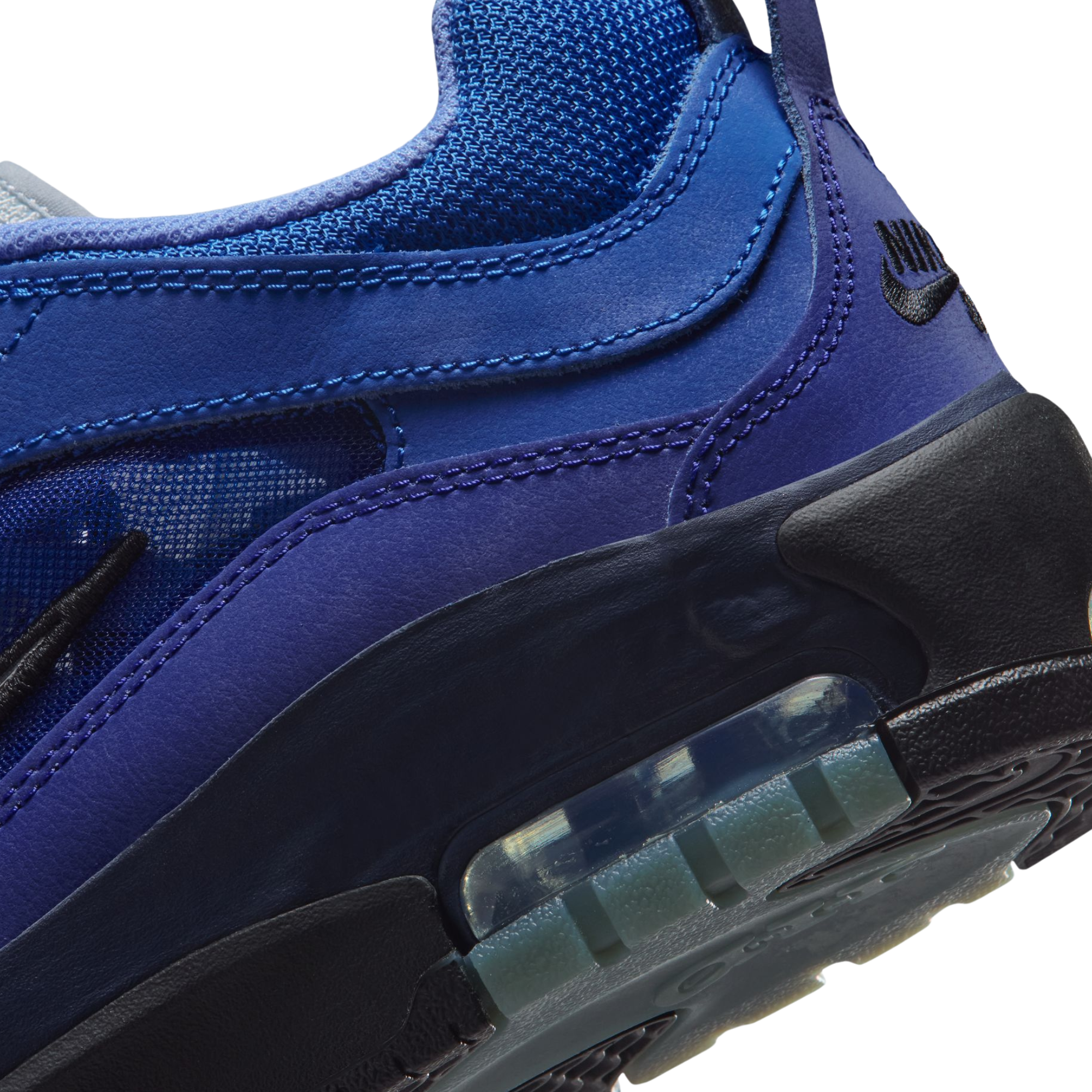 A Nike sb ishod wair Air Max sneaker in a vibrant royal blue colorway, featuring a black Swoosh logo, black laces, and a black midsole, shown from a side profile on a white background.