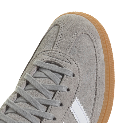 grey adidas handball spezial juniors sneakers with white stripes and gum sole on a white background