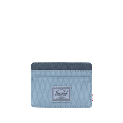 2 tone blue herschel charlie front pocket card wallet on a white background