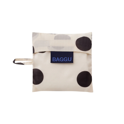 cream baby baggu reusable tote bag with black polka dots on a white background