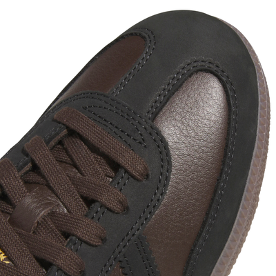 brown leather and suede men's adidas skateboarding adv sneaker with gum sole on a white background
