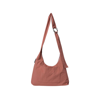 pink thread slouchy shoulder bag on a white background