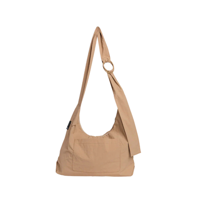 Beige thread slouchy shoulder bag on a white background