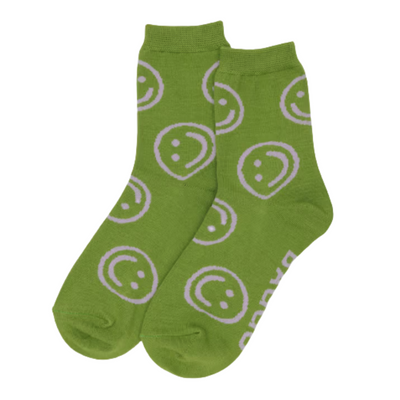 Green baggu crew socks with pink smiley face patterns on a white background