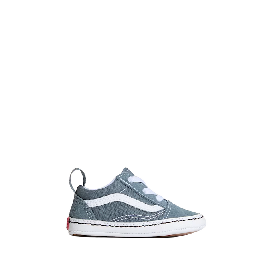 Blue vans toddler old skool shoe with white sole on a white background