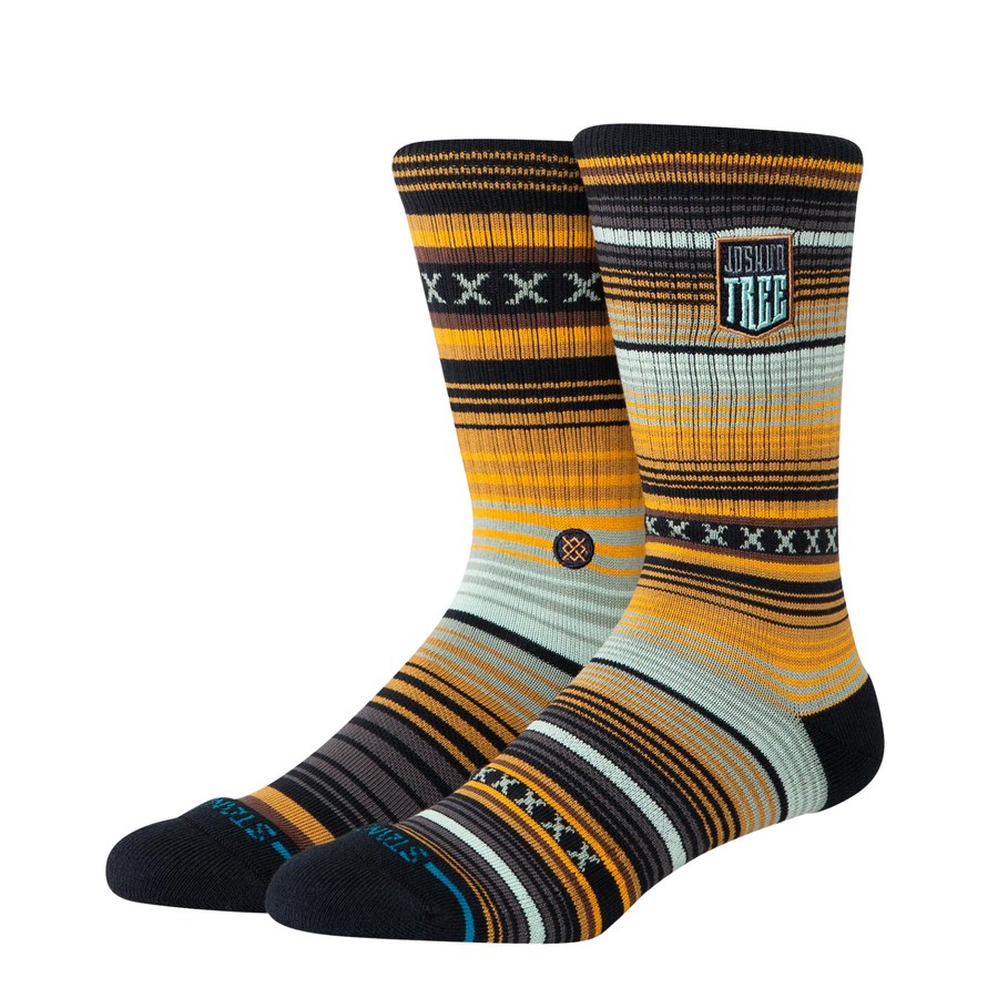 stance joshua tree curren gold & blue striped socks on a white background