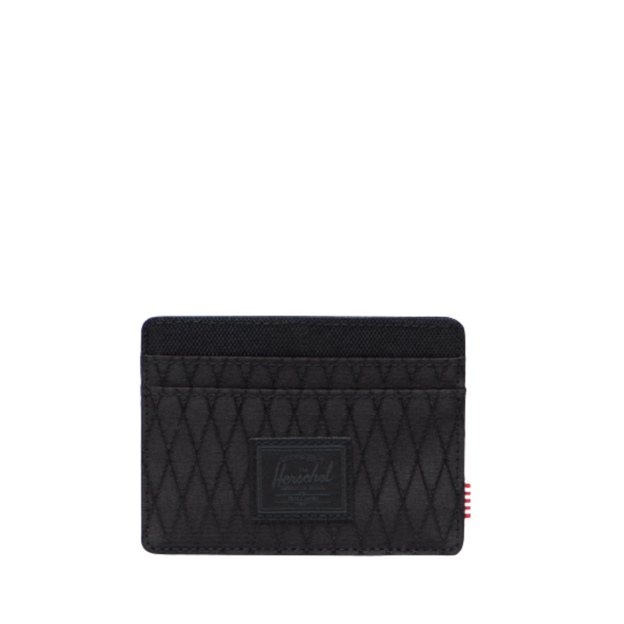 Black quilted herschel charlie wallet with Herschel logo on a white background