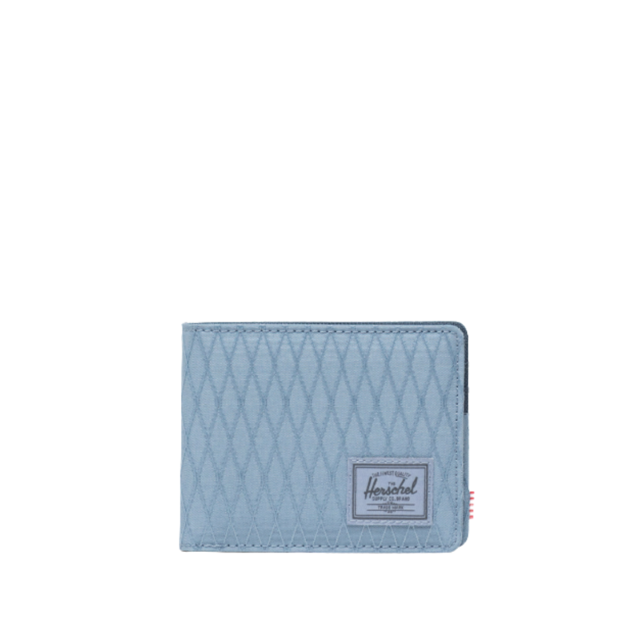 blue herschel roy wallet on a white background