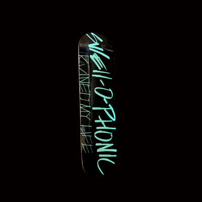 glow in the dark skateboard deck with SWELL-O-PHONIC ruined my life in glow blue/green text on a white background