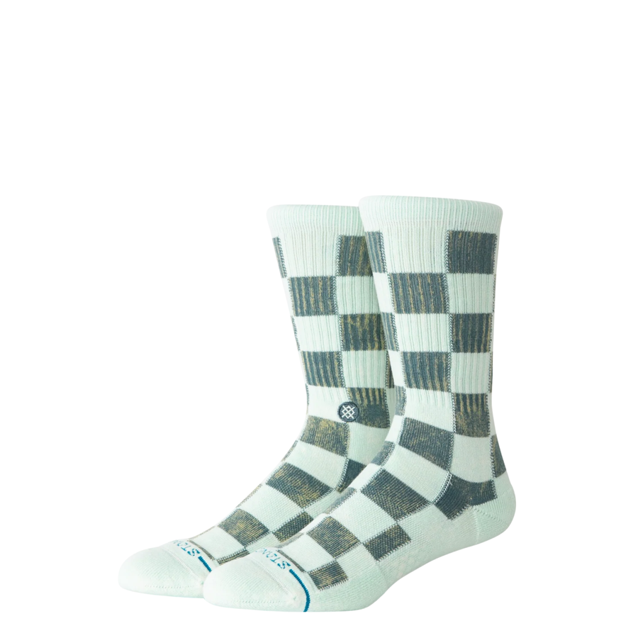 light green and dark green checkerboard stance dance floor crew socks on a white background