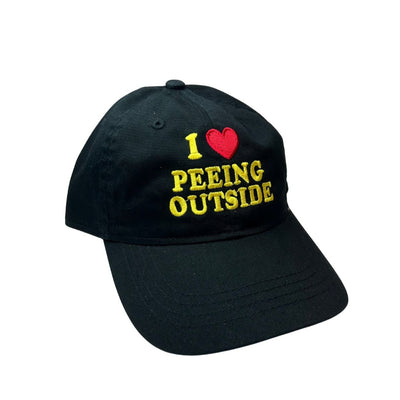 Black cap with text 'I ❤️ Peeing Outside' on a white background