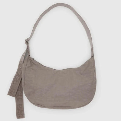 tan nylon crescent shaped baggu bag