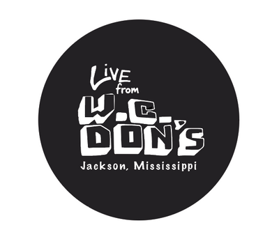 button with live from w.c. don's jackson mississippi in white ink