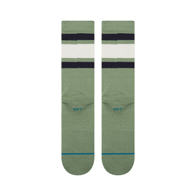 Pair of green stance men's boyd st crew socks with black and white stripes on a white background