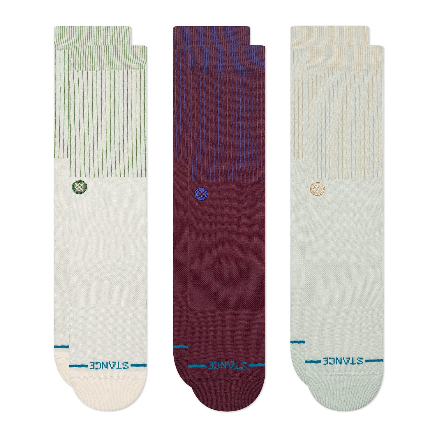 Three pairs of stance icon socks in green, purple, and beige with 'Stance' branding on a white background.